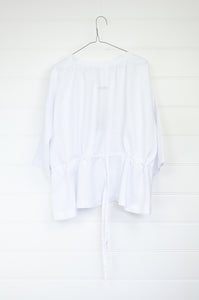 Banana Blue made in Melbourne white linen top with peplum tie.