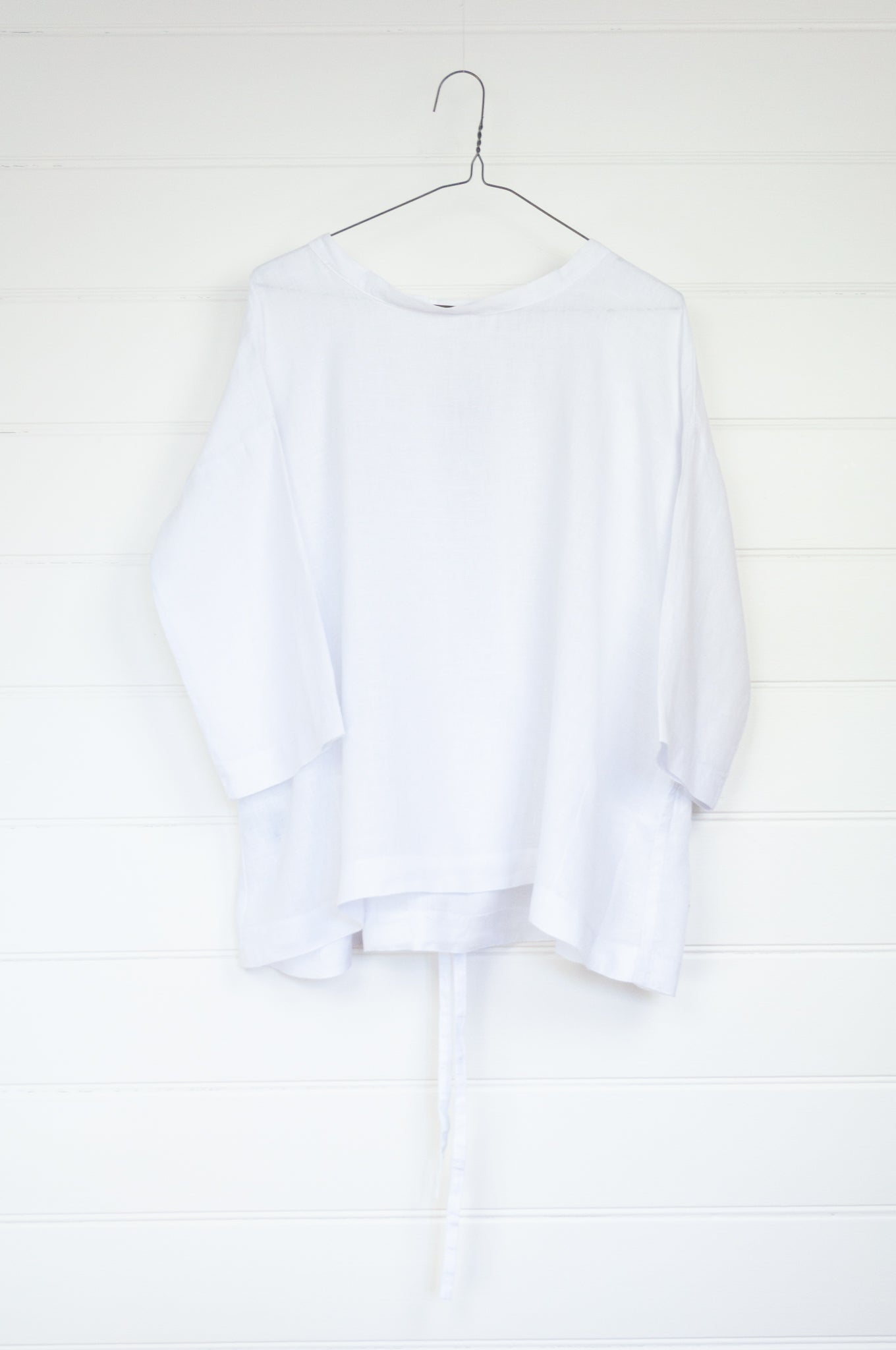 Banana Blue made in Melbourne white linen top with peplum tie.