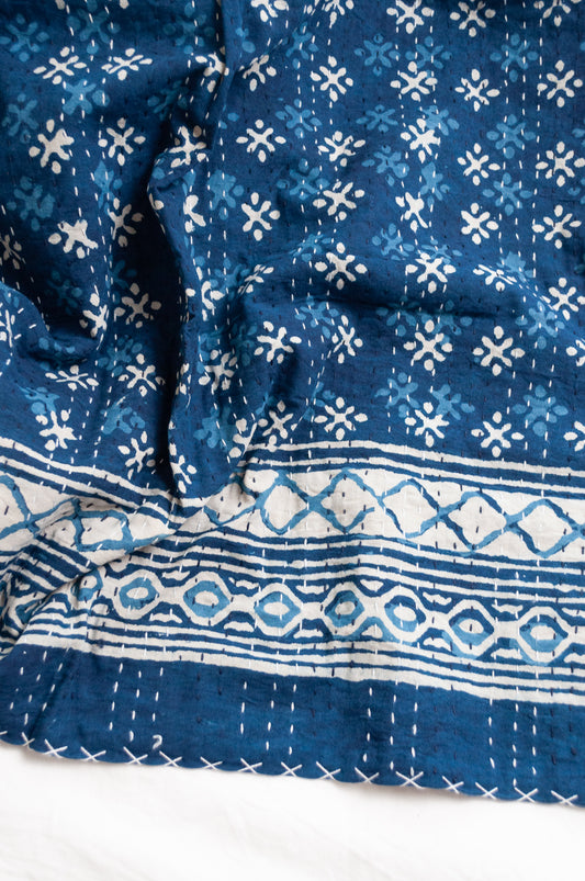 Indigo blue and white pure cotton kantha stitch bed quilt with diamond dot design.