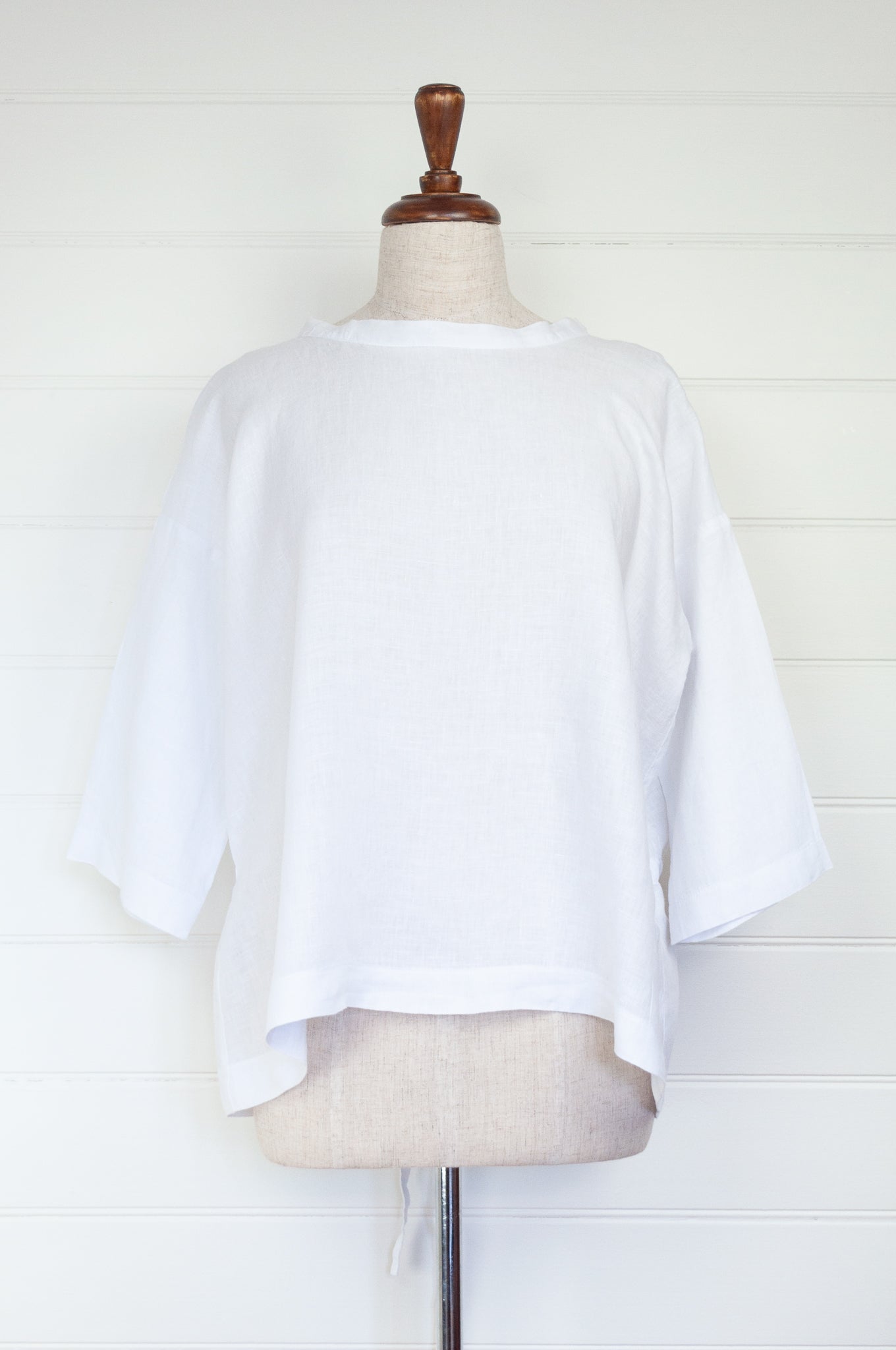 Banana Blue made in Melbourne white linen top with peplum tie.