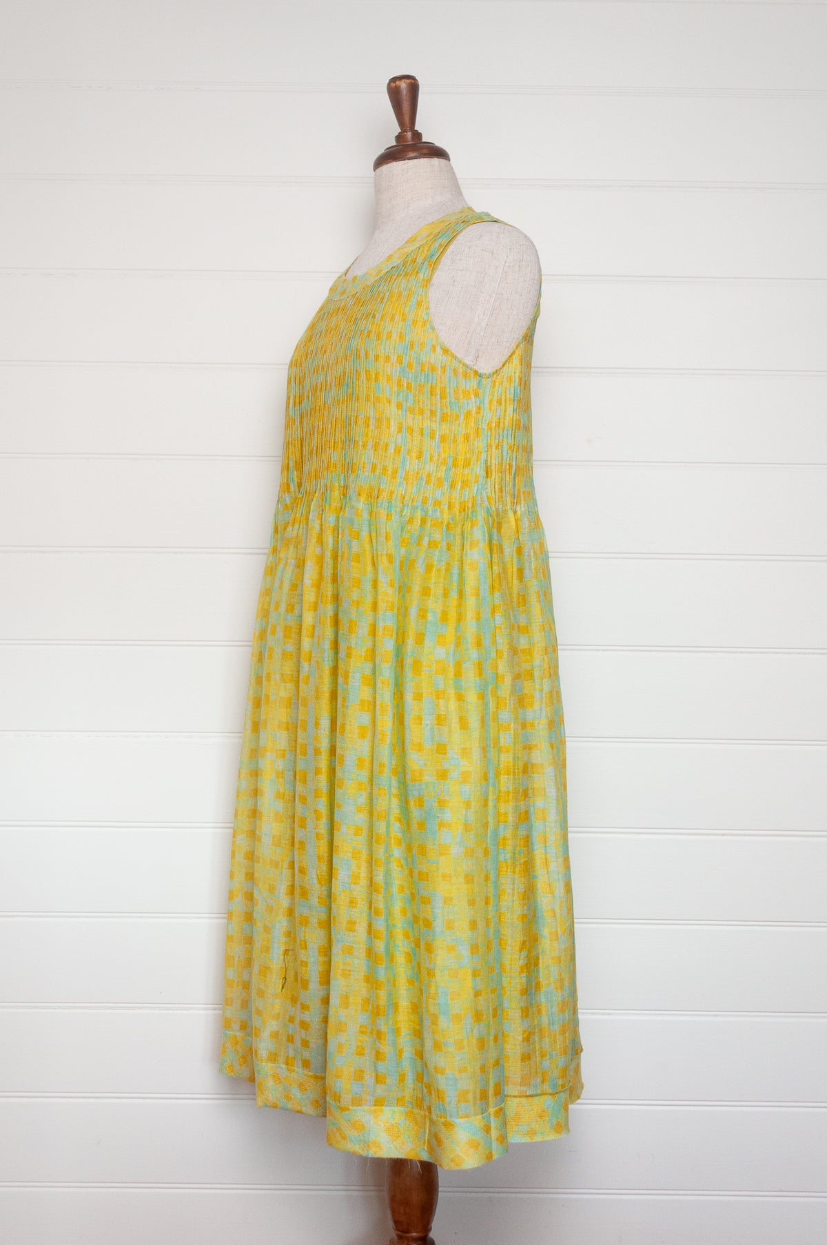 Neeru Kumar fine cotton silk pintucked sleeveless sundress in lime yellow with aqua check.