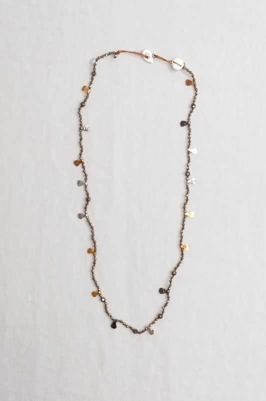 Mary Gaitani handmade pyrite necklace with silver and gold charms.