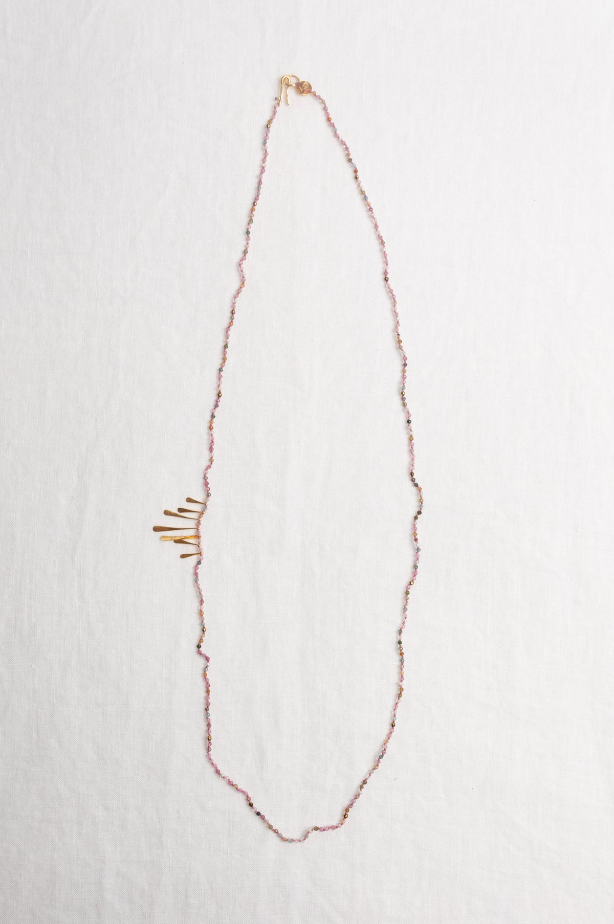 Mary Gaitani handmade tourmalines necklace with gold charms.