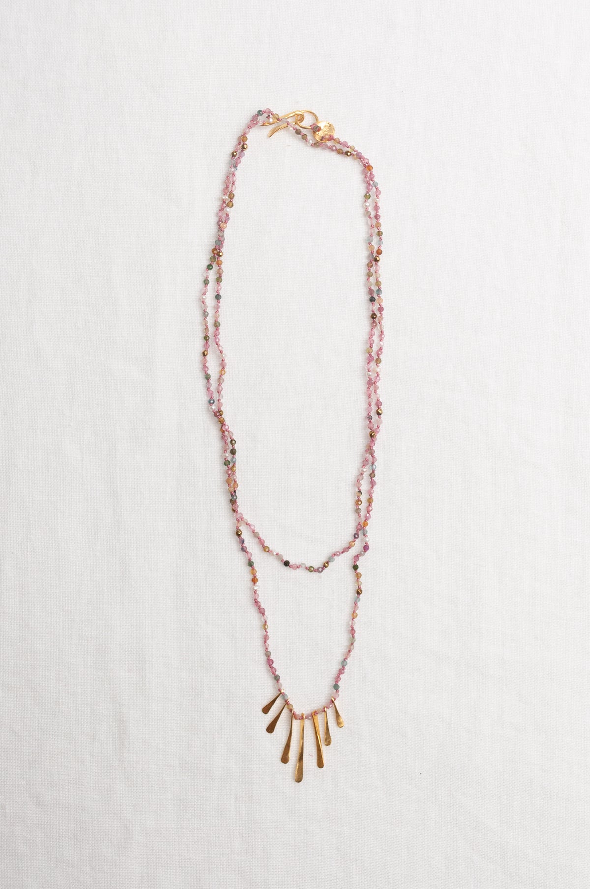Mary Gaitani handmade tourmalines necklace with gold charms.