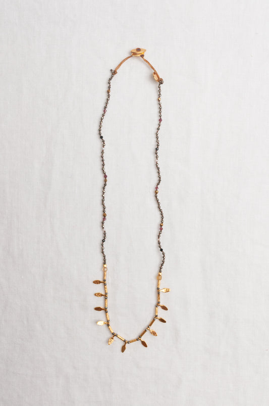 Mary Gaitani handmade pyrite necklace with gold charms.