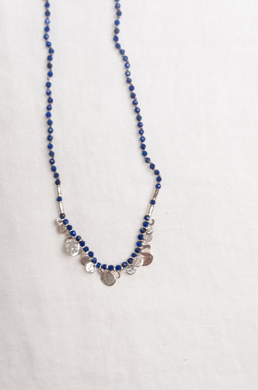Mary Gaitani handmade lapis necklace with silver charms.