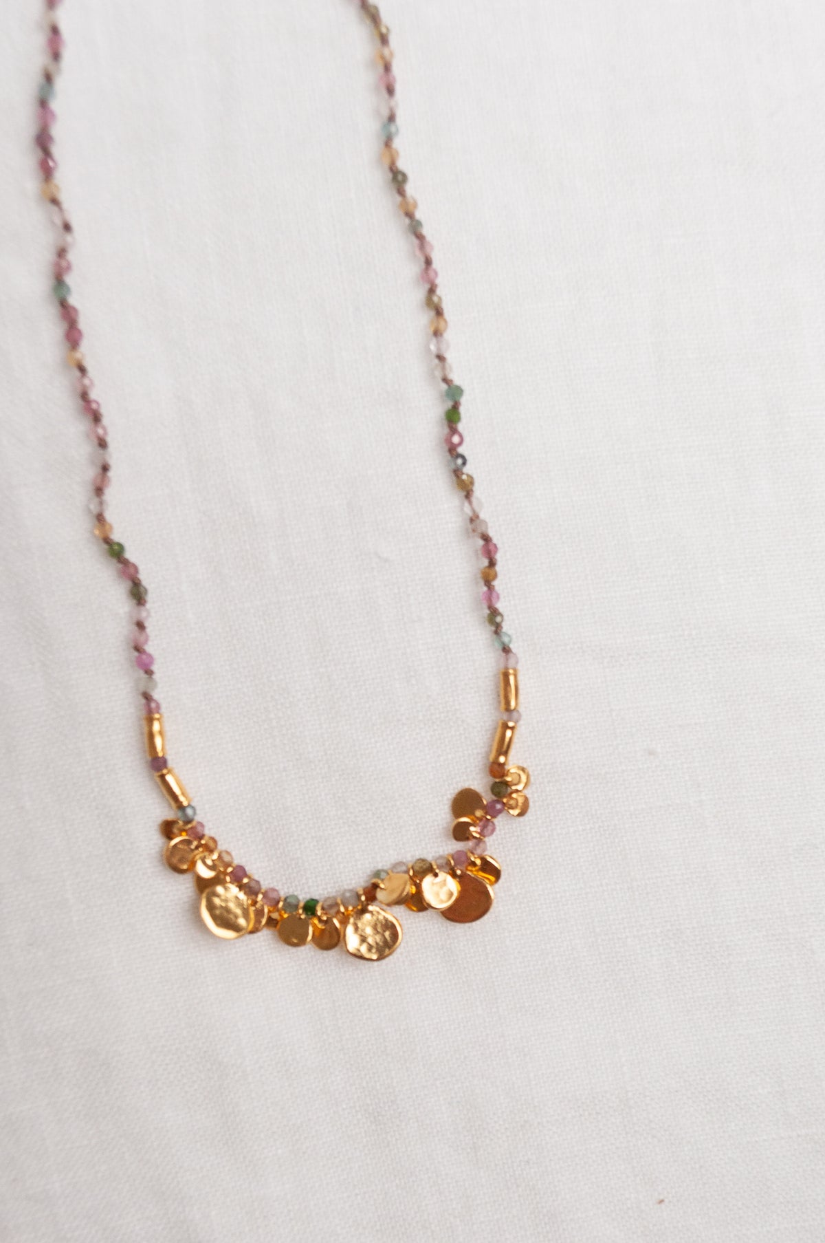 Mary Gaitani handmade tourmalines necklace with gold charms.