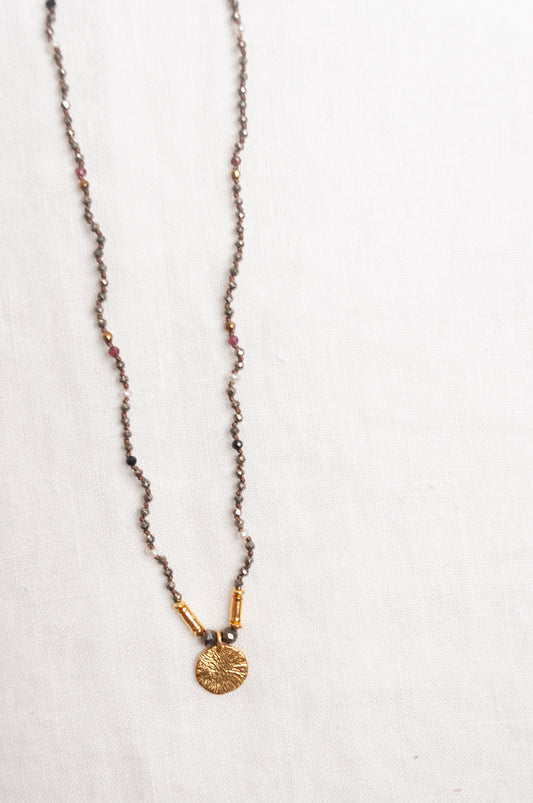 Mary Gaitani handmade pyrite necklace with gold charms.