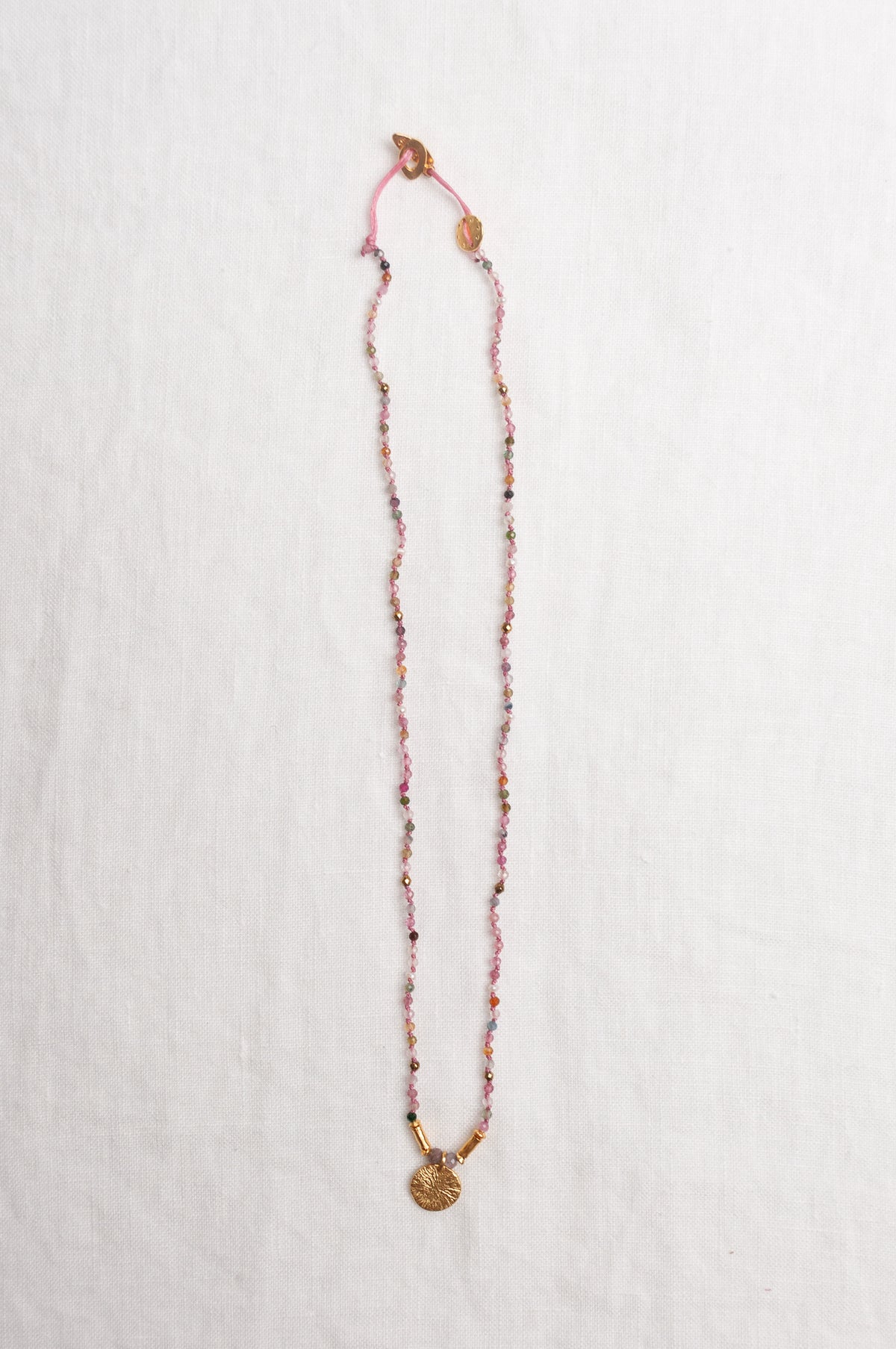Mary Gaitani handmade tourmalines necklace with gold charms.