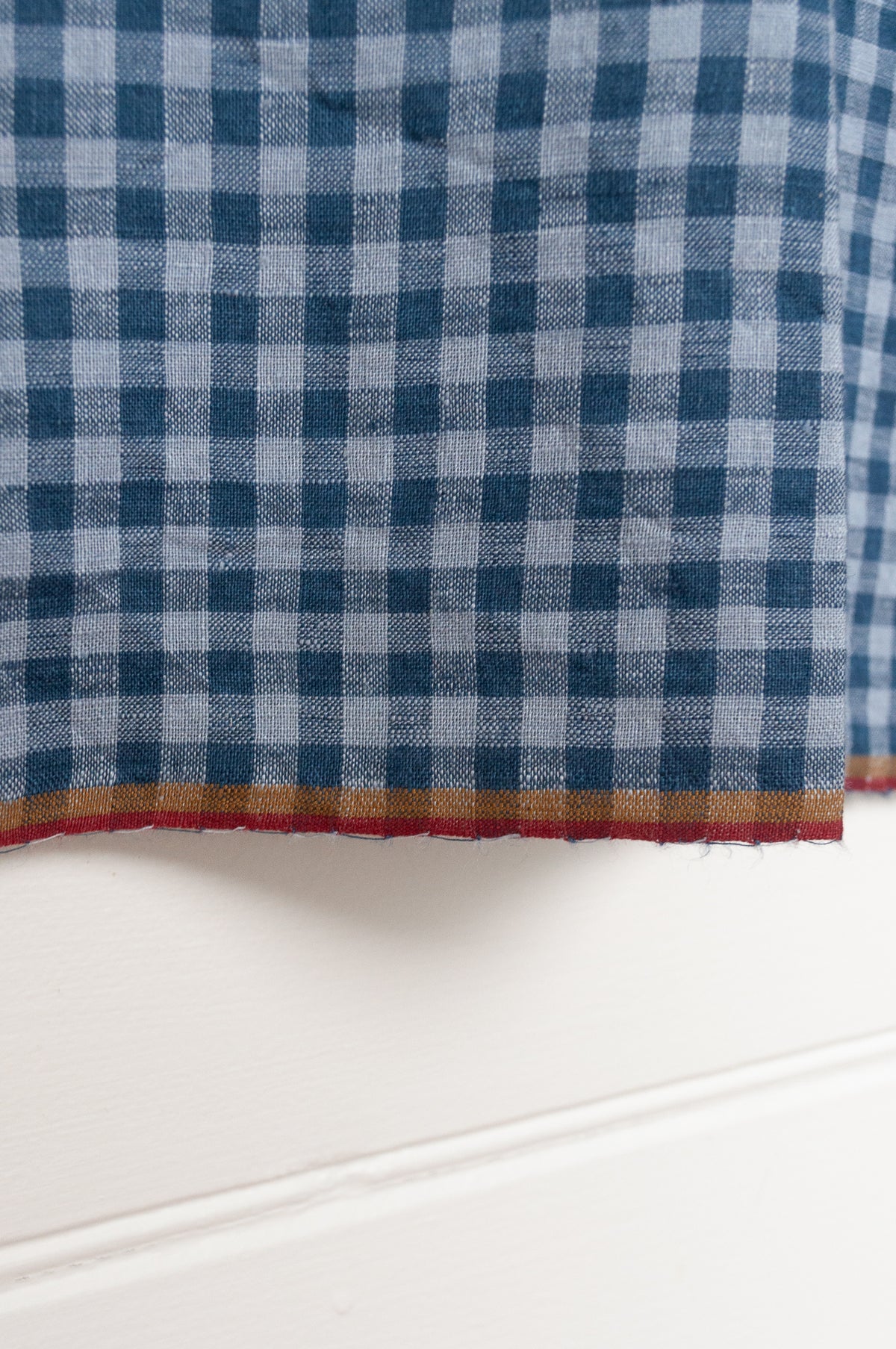 DVE Aishani sleeveless one size top in handloom linen in blue ashes check gingham.
