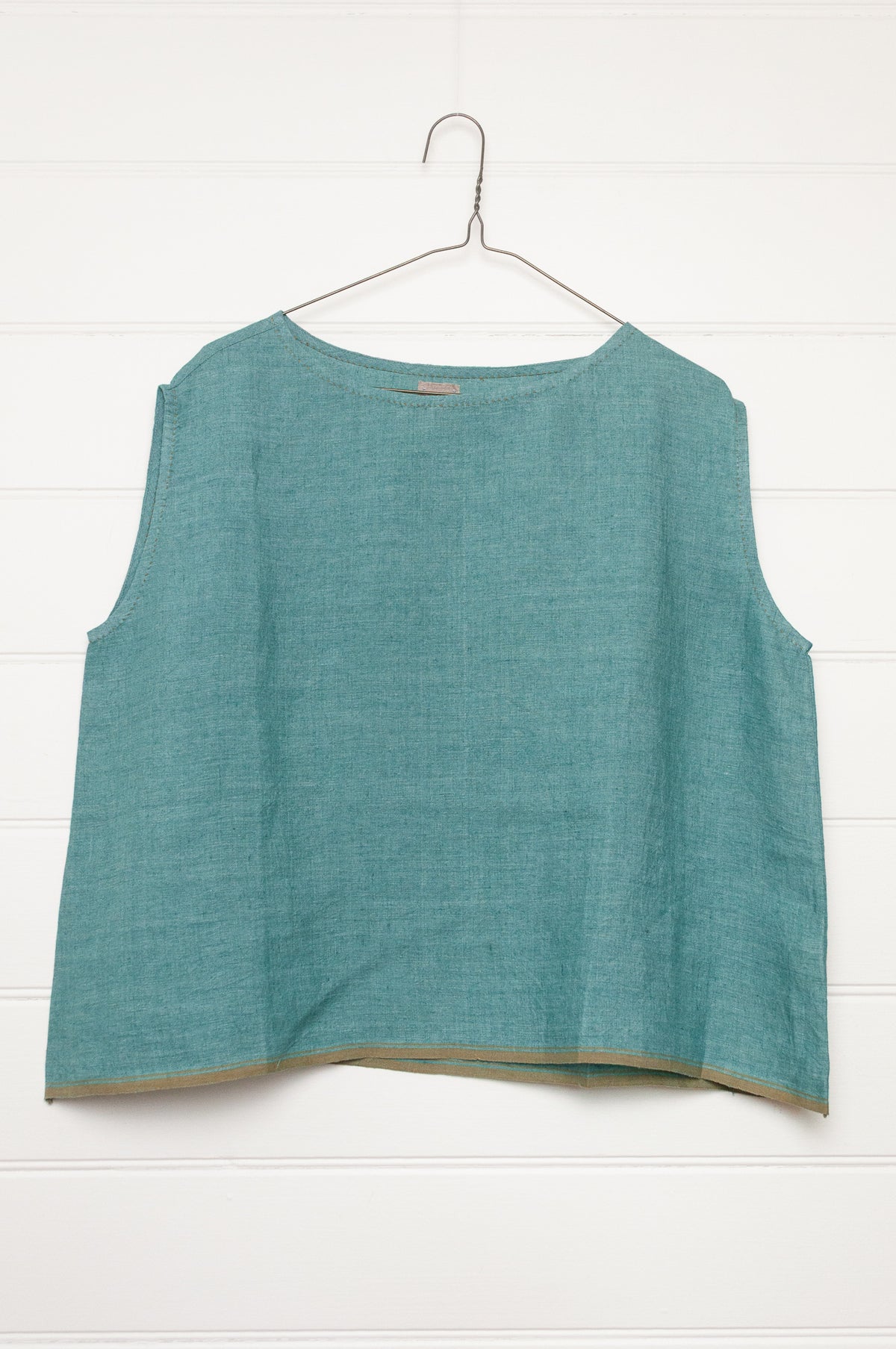 DVE Aishani one size crop sleeveless top in mineral green handloom linen.