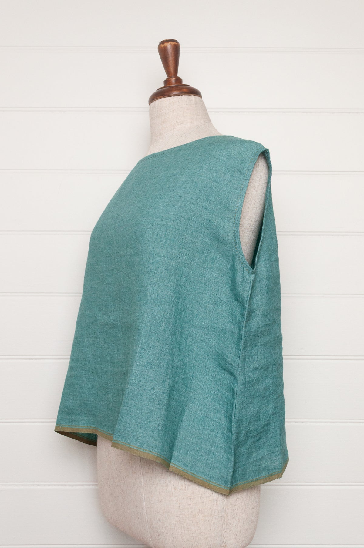 DVE Aishani one size crop sleeveless top in mineral green handloom linen.