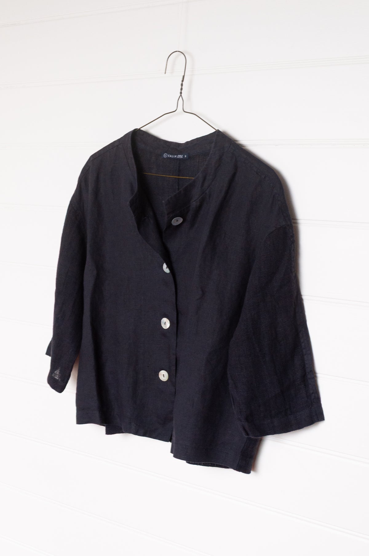 Valia pure linen Port Fairy jacket made in Melbourne with round neck, gauze panels and button closure in deep navy blue.