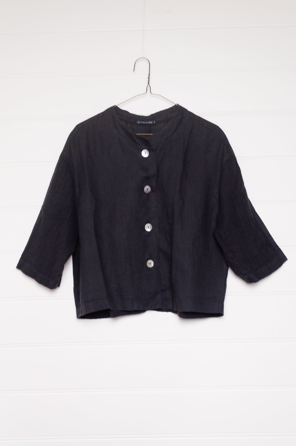 Valia pure linen Port Fairy jacket made in Melbourne with round neck, gauze panels and button closure in deep navy blue.