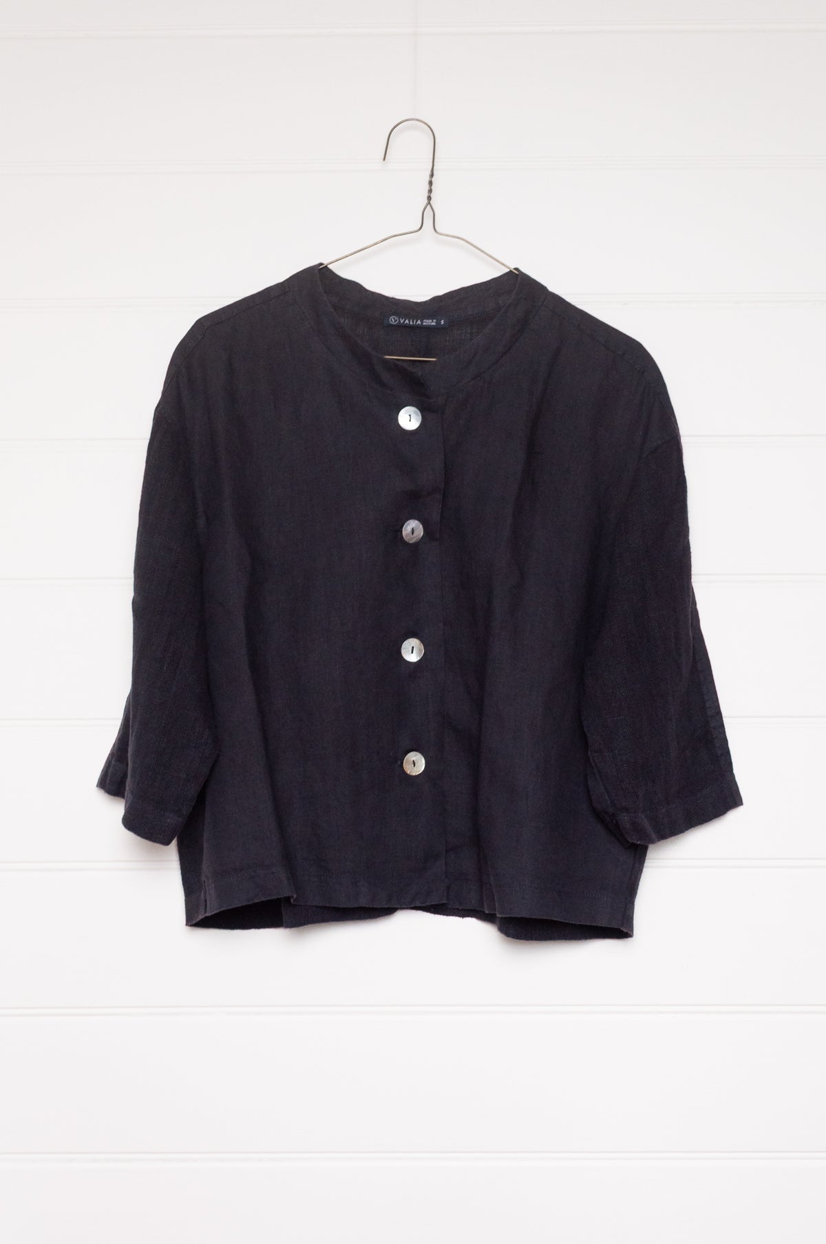 Valia pure linen Port Fairy jacket made in Melbourne with round neck, gauze panels and button closure in deep navy blue.