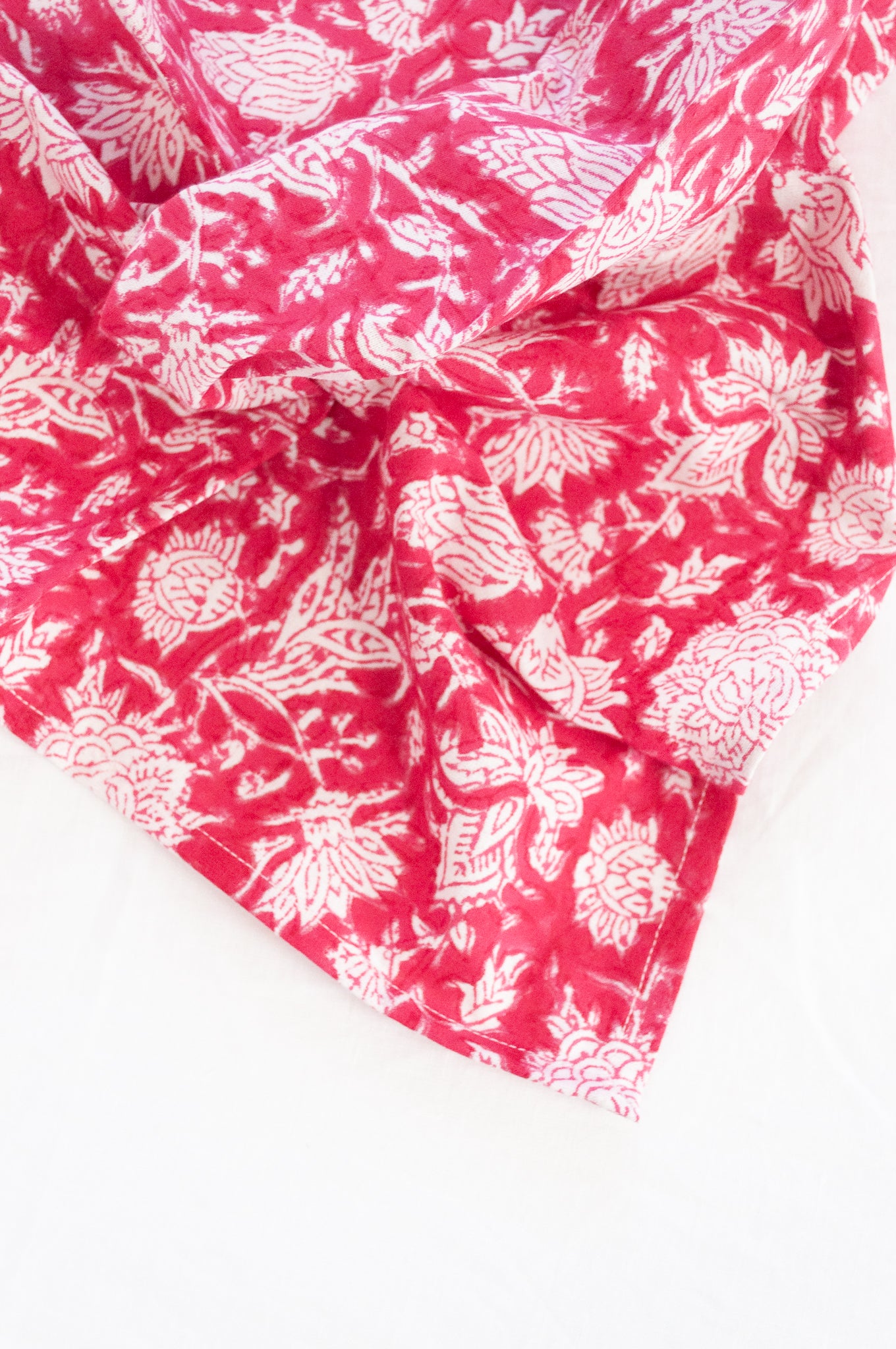 Blockprinted  cotton napkins in raspberry red and white floral design, made by hand.