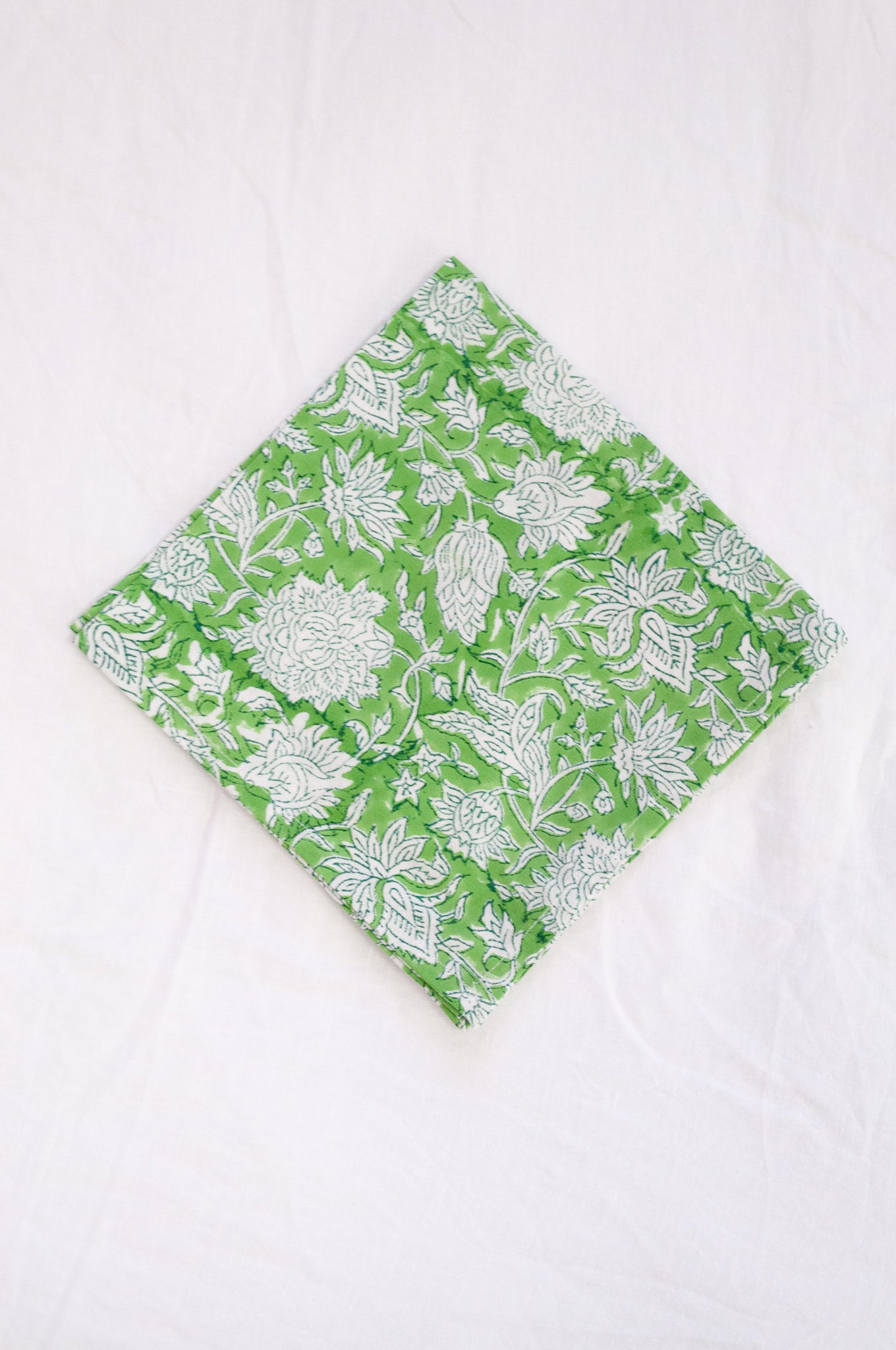 Blockprinted  cotton napkins in lime green and white floral design, made by hand.