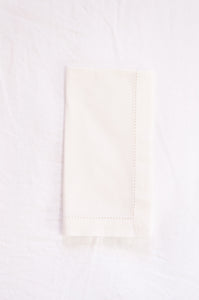 Plain cotton napkins with faggot hem detail in white.