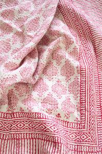 Raspberry red on white Mughal motif blockprint kantha quilt.