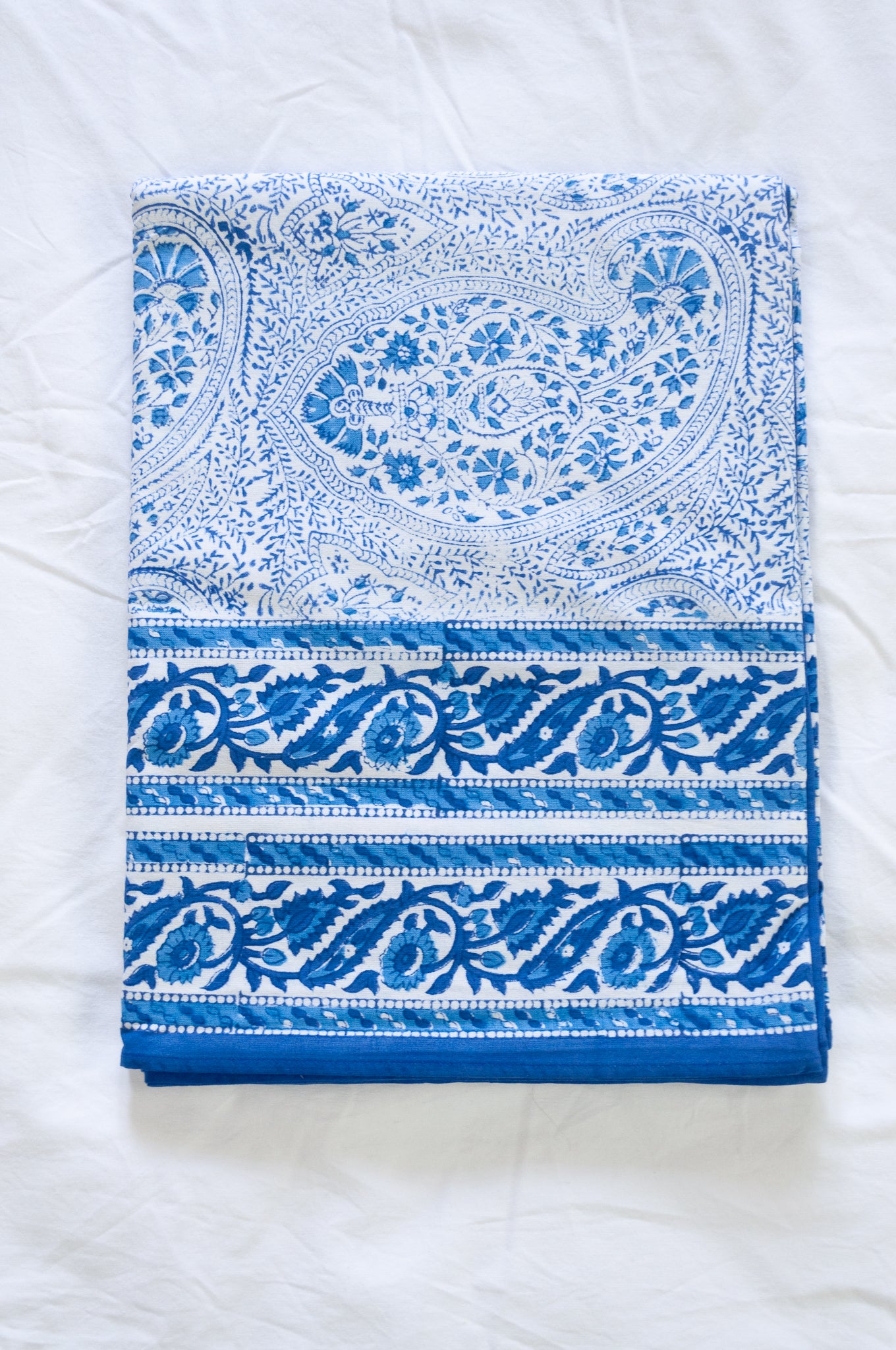 Blue and white paisley tablecloth, blockprinted by hand.
