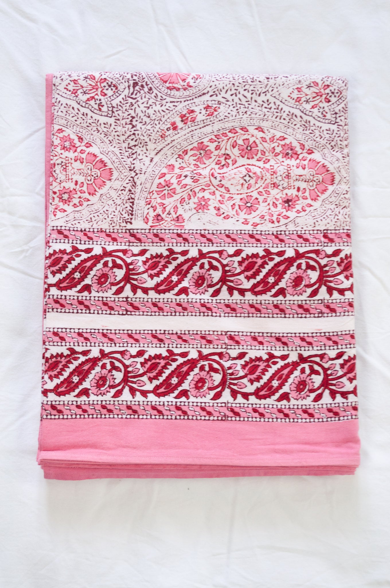 Pink and white paisley tablecloth, blockprinted by hand.