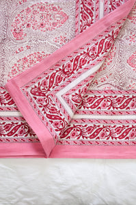 Pink and white paisley tablecloth, blockprinted by hand.