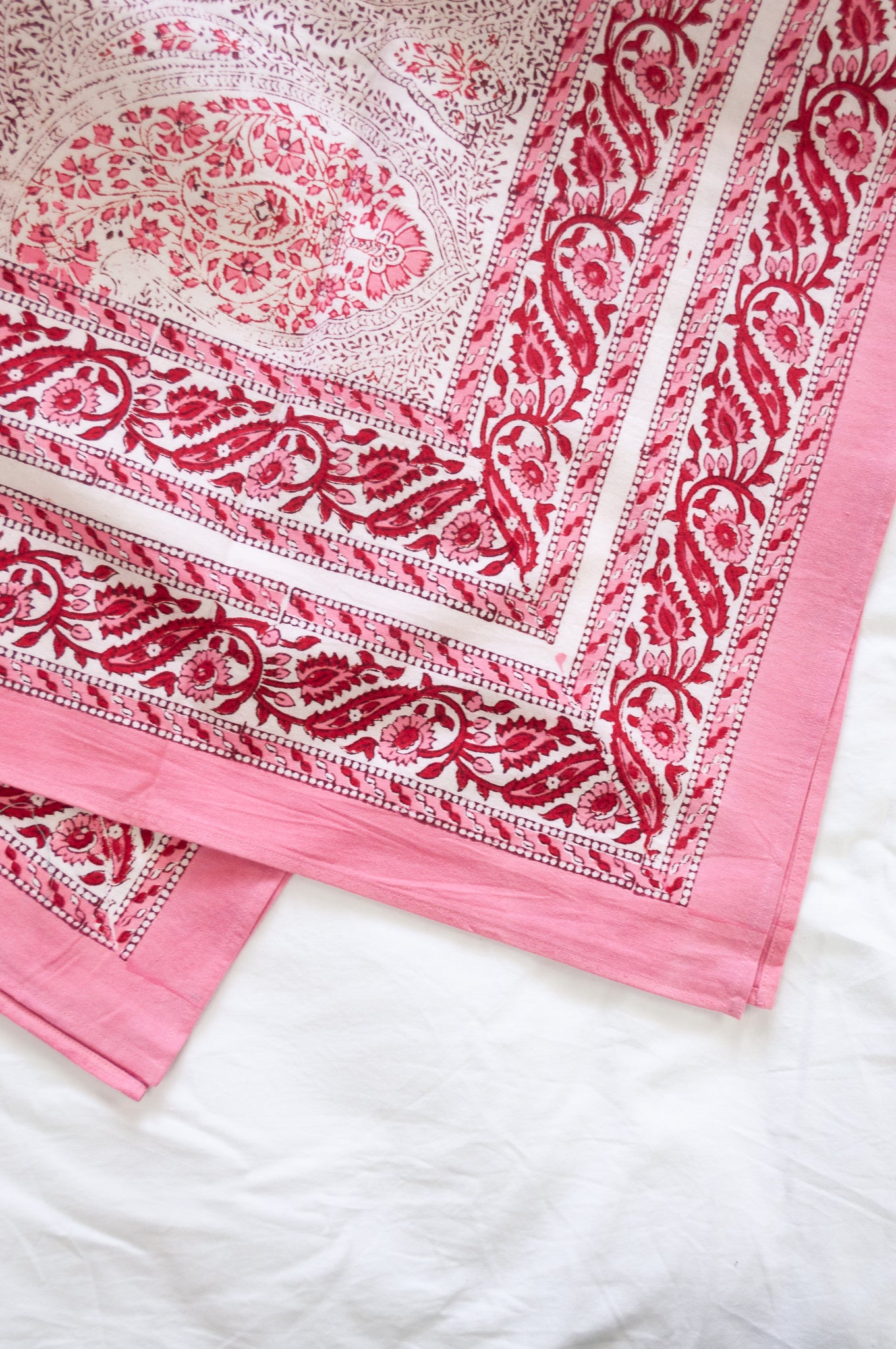 Pink and white paisley tablecloth, blockprinted by hand.