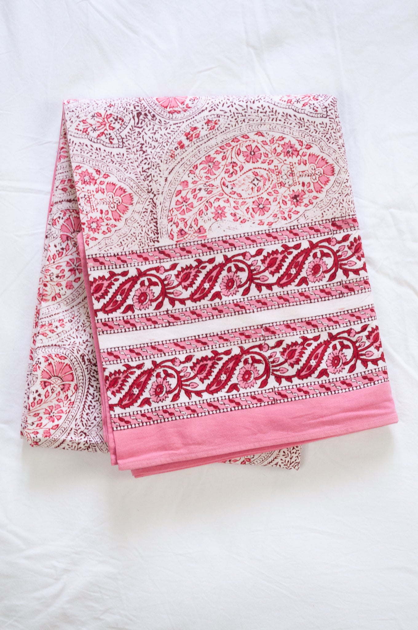 Pink and white paisley tablecloth, blockprinted by hand.