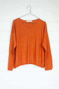 Cotton and cashmere one size easy fit V-neck sweater in  tamarind tan brown.