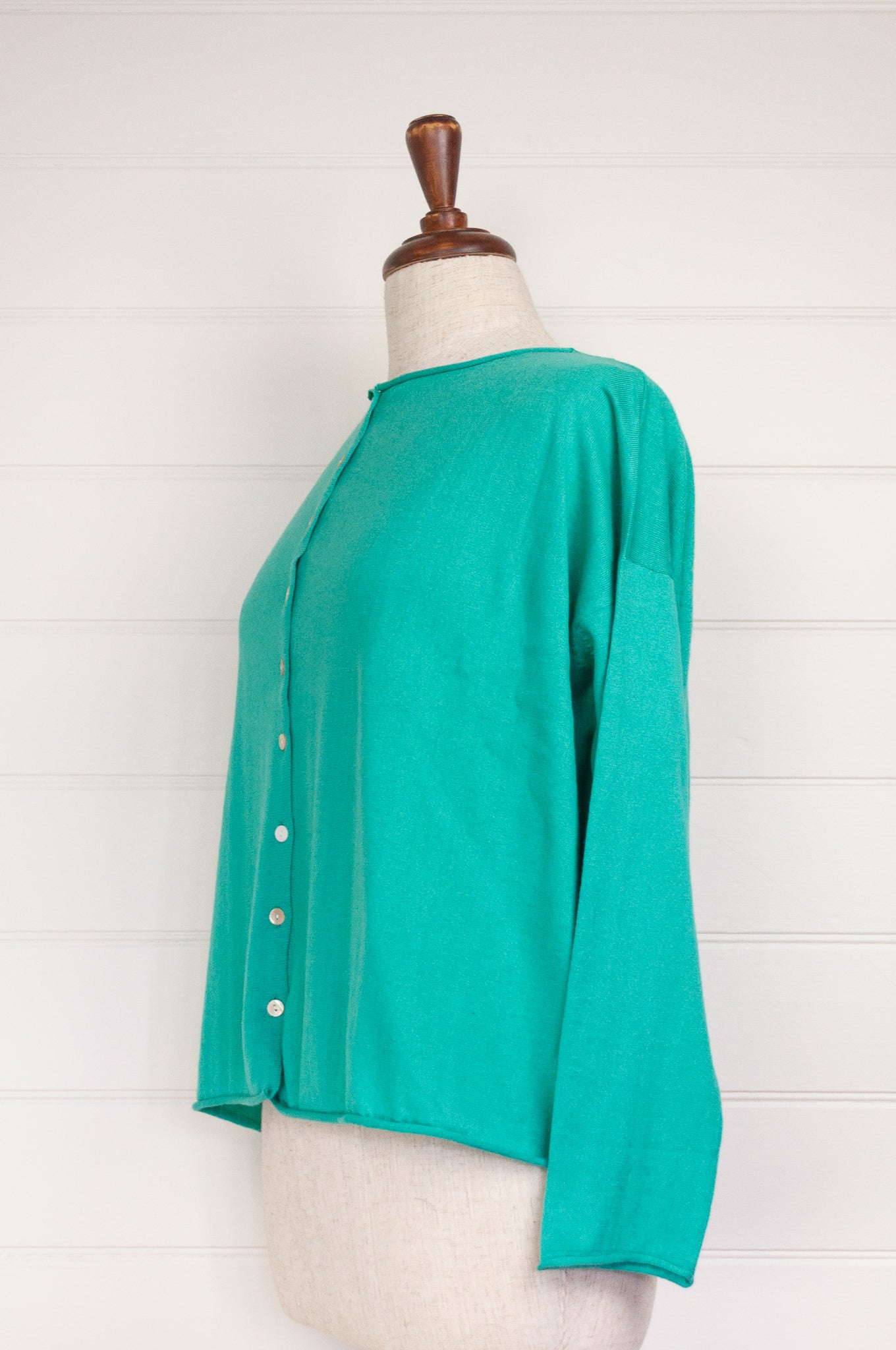 Cotton and cashmere one size easy fit reversible button up cardigan in jade green.