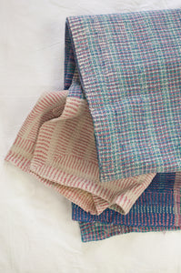 Large vintage kantha quilt in stripes and checks, blue, lavender, mint, pink and white.