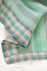 Vintage kantha quilt in pastel stripes and checks, mint, rose pink, lavender and white.