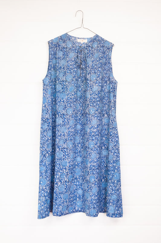 Juniper Hearth Stella dress in blue grey blockprint floral cotton, A-line sleeveless with front ties.