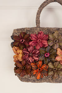 Beautiful hand crocheted crochet small bag with colourful flowers.