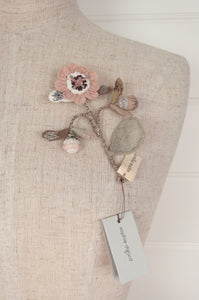 Sophie Digard floral brooch, hand embroidered and crocheted in line in soft neutral tones.