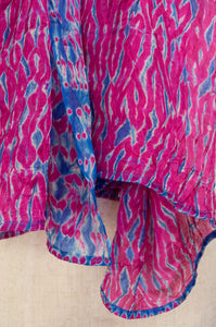 Magenta pink and cobalt blue silk shibori scarf.