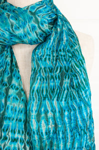 Turquoise silk shibori scarf.