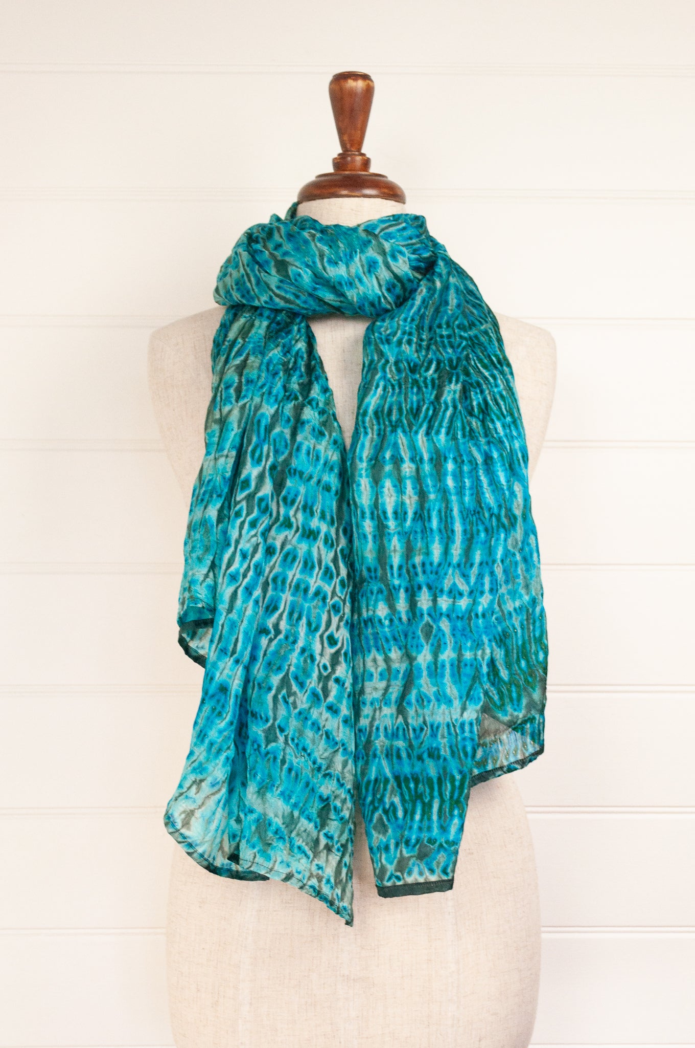 Turquoise silk shibori scarf.
