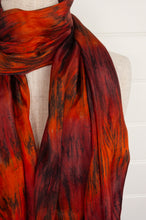 Load image into Gallery viewer, Tie dye silk scarf in shades of burnt orange, deep red and bronze.