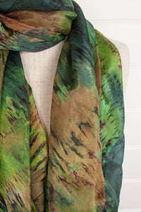 Tie dye pure silk scarf in shades of green and brown.