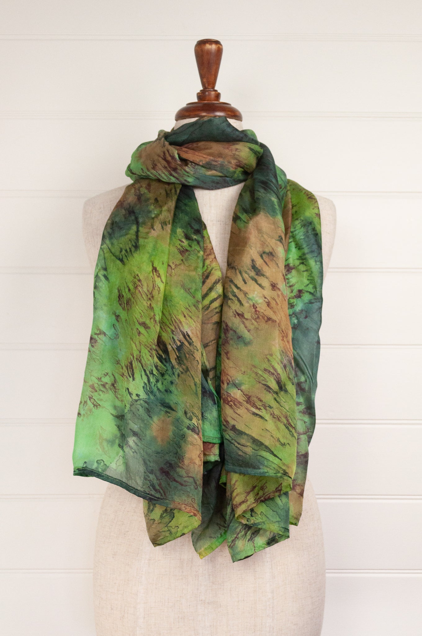 Tie dye pure silk scarf in shades of green and brown.