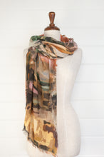Load image into Gallery viewer, Juniper Hearth fine wool and modal scarf with an earth toned abstract landscape print.