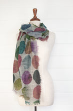 Load image into Gallery viewer, Juniper Hearth fine wool and modal scarf with multi coloured large dots on a blue grey background.