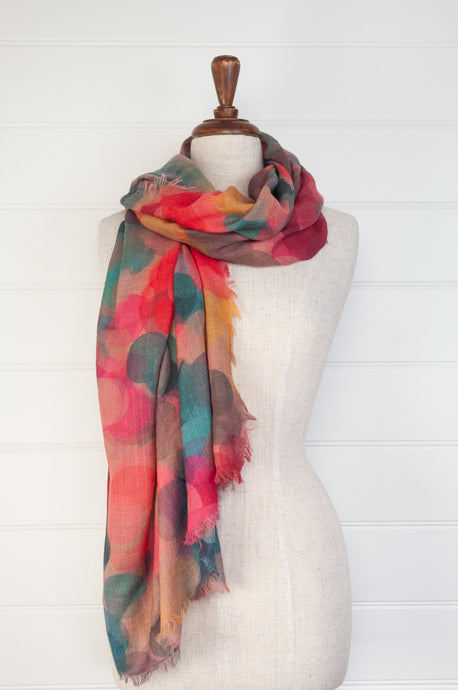 Juniper Hearth fine wool and modal scarf with an overlapping colourful spot design.