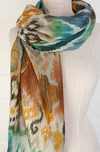 Juniper Hearth fine wool silk scarf in mustard and teal ikat design.