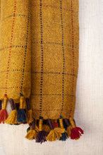 Load image into Gallery viewer, Juniper Hearth handwoven baby yak scarf with hand finished details and rainbow tassels in mustard yellow.