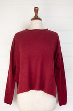 Load image into Gallery viewer, Baby yak sweater with round neck and side slits in cherry red.