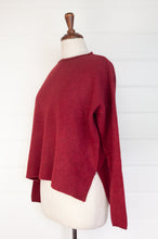 Load image into Gallery viewer, Baby yak sweater with round neck and side slits in cherry red.