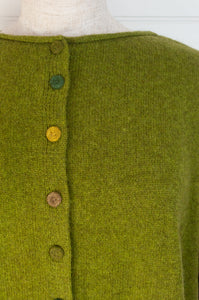 Baby yak one size reversible cardigan sweater with hand embroidered buttons in chartreuse green.