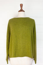 Load image into Gallery viewer, Baby yak one size reversible cardigan sweater with hand embroidered buttons in chartreuse green.